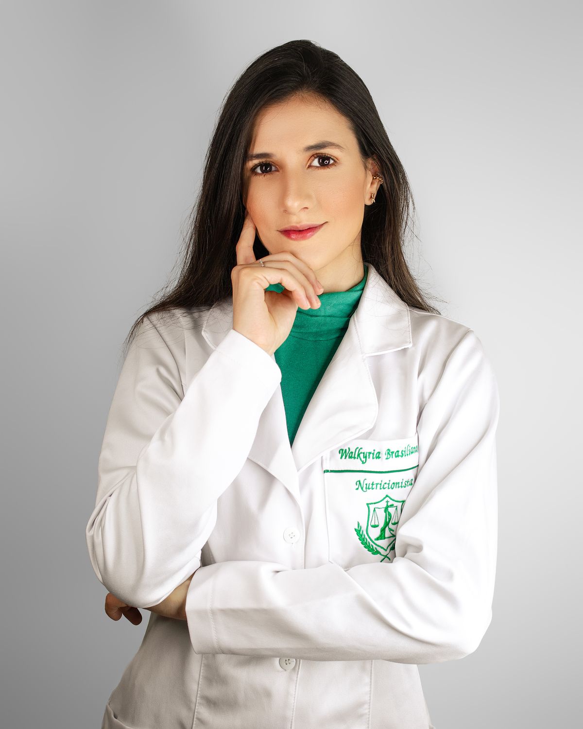 Portrait photo of a female veterinarian in a white coat